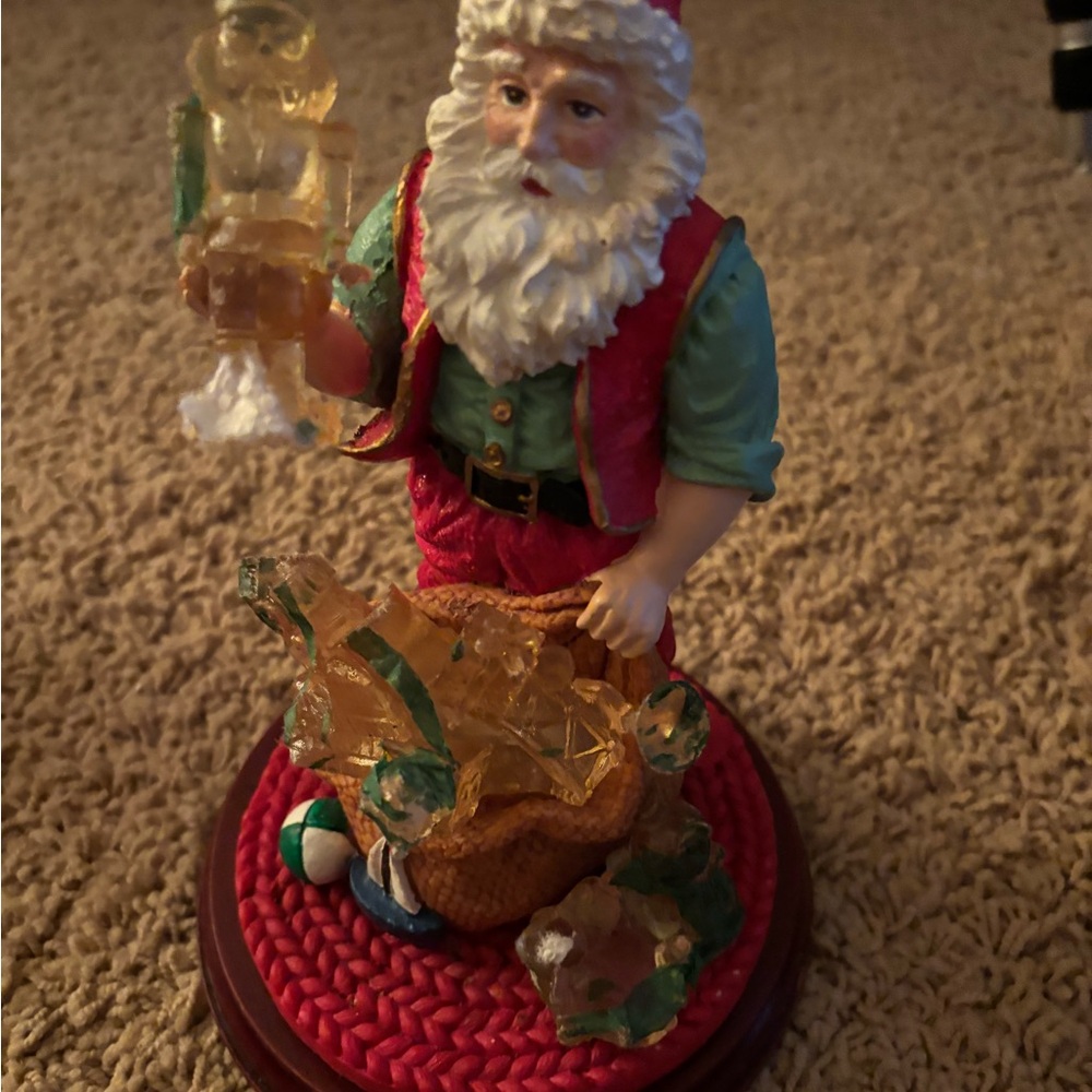 Festive Santa Claus Figurine with Red and Green Accents